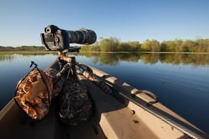 A camera sits on the back of a kayak for kayak photography.