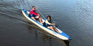 two people on a kayak on lake