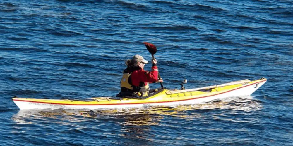 woman kayaking on ocean