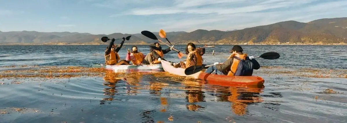 multiple people in  Tandem Fishing Kayak
